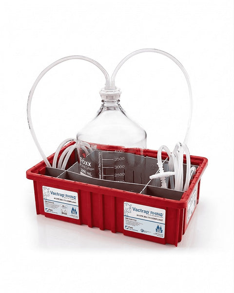 Laboratory setup with glass flask and accessories in a red tray on a white background