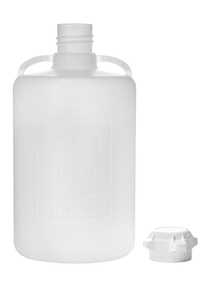 White plastic bottle with cap on a white background